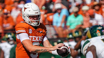 Texas Longhorns quarterback Quinn Ewers (3) snaps the ball during the game against Colorado State at Darrell K Royal-Texas Memorial Stadium in Austin Saturday, Aug. 31, 2024.