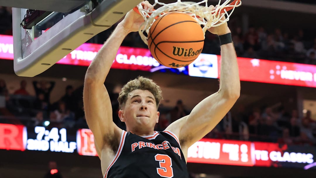 Dec 21, 2024; Newark, New Jersey, USA; Princeton Tigers forward Caden Pierce (3) dunks the ball against the Rutgers Scarlet Knights during the second half at Prudential Center.