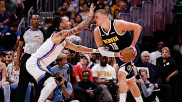 May 11, 2025; Denver, Colorado, USA; Denver Nuggets center Nikola Jokic (15) controls the ball under pressure from Oklahoma City Thunder forward Jaylin Williams (6) in the second quarter during game four of the second round of the 2025 NBA Playoffs at Ball Arena. Mandatory Credit: Isaiah J. Downing-Imagn Images