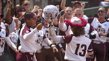 Texas A&M infielder Amari Harper (13) celebrates a home run as she runs home during the NCAA D1 Softball Tournament Regional against Saint Francis University at Davis Diamond at Texas A&M University on Friday, May 16, 2025 in College Station, Texas.