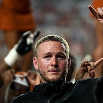 Sep 14, 2024; Austin, Texas, USA; Texas Longhorns quarterback Quinn Ewers (3) holds up the sign of the horns after the win over UTSA at Darrell K Royal–Texas Memorial Stadium. Mandatory Credit: Aaron E. Martinez/USA TODAY Network via Imagn Images