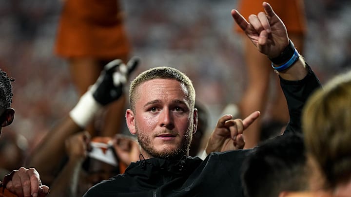 Sep 14, 2024; Austin, Texas, USA; Texas Longhorns quarterback Quinn Ewers (3) holds up the sign of the horns after the win over UTSA at Darrell K Royal–Texas Memorial Stadium. Mandatory Credit: Aaron E. Martinez/USA TODAY Network via Imagn Images