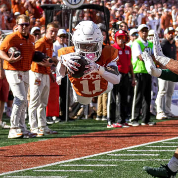 Texas Longhorns receiver Silas Bolden (11) dives for a touchdown during the game against Colorado State at Darrell K Royal-Texas Memorial Stadium in Austin Saturday, Aug. 31, 2024.