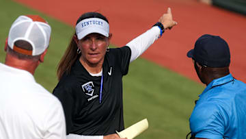 Kentucky head coach Rachel Lawson meets Texas Longhorns head coach Mike White ahead of the game at Red & Charline McCombs Field on Thursday, May 1, 2025 in Austin.