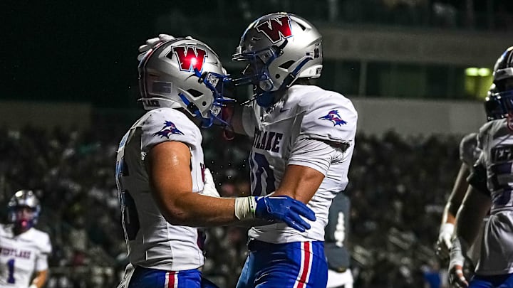 Westlake's Cal Livengood (10) celebrates a TD with running back Grady Bartlett (36) against Steele on Friday night. Westlake's Cal Livengood (10) celebrates a TD with running back Grady Bartlett (36) against Steele on Friday night.