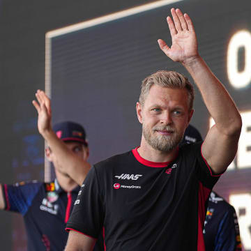 MoneyGram Haas driver Kevin Magnussen waves to the crowd as he leaves the stage during driver engagements in the Germania Insurance Amphitheater at Circuit of Americas on Saturday Oct. 21, 2023 ahead of the Formula 1 Lenovo United States Grand Prix on Sunday.