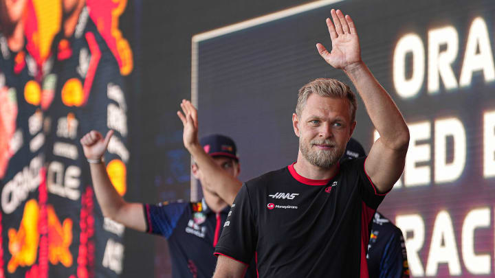 MoneyGram Haas driver Kevin Magnussen waves to the crowd as he leaves the stage during driver engagements in the Germania Insurance Amphitheater at Circuit of Americas on Saturday Oct. 21, 2023 ahead of the Formula 1 Lenovo United States Grand Prix on Sunday.