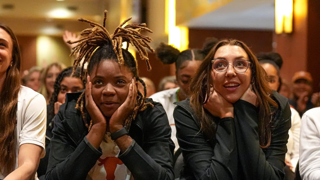 Texas Longhorns forwards DeYona Gaston (5) and Taylor Jones (44) watch the NCAA women’s basketball tournament selection show at the University of Texas at Austin on Sunday, March 17, 2024.