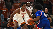 Texas Longhorns forward Jamie Vinson (4) guards Houston Christian guard Elijah Brooks (4) during the game at the Moody Center on Friday, Nov. 8, 2024 in Austin.