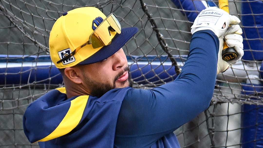 Milwaukee Brewers catcher Jeferson Quero (76) takes batting practice during spring training workouts Monday, February 17, 2025, at American Family Fields of Phoenix in Phoenix, Arizona.