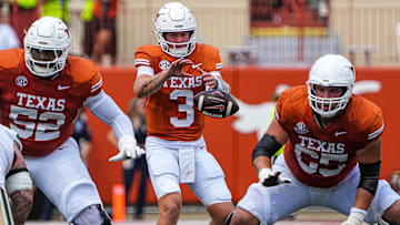 Texas Longhorns quarterback Quinn Ewers (3) snaps the ball during the game against Colorado State at Darrell K Royal-Texas Memorial Stadium in Austin Saturday, Aug. 31, 2024.