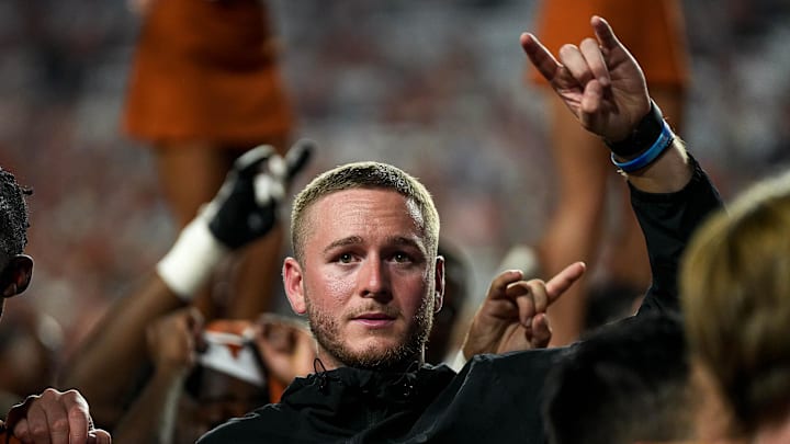 Sep 14, 2024; Austin, Texas, USA; Texas Longhorns quarterback Quinn Ewers (3) holds up the sign of the horns after the win over UTSA at Darrell K Royal–Texas Memorial Stadium.