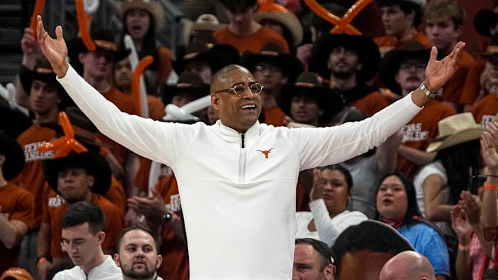 Texas Longhorns head coach Rodney Terry reacts to a call by an official during the basketball game.