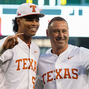 Texas Longhorns head football coach Steve Sarkisian takes a photo with pitcher Jonah Williams (55) ahead of the Lone Star Showdown against Texas A&M at UFCU Disch-Falk Field on Friday, April 25, 2025.
