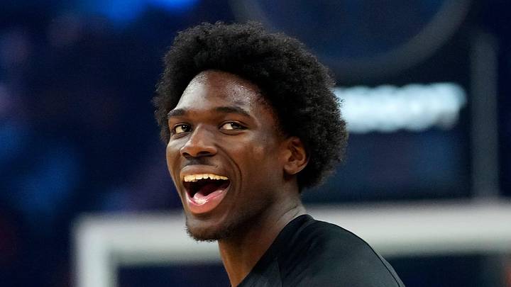 Suns forward Rasheer Fleming (20) laughs with his teammates prior to a game against the Bucks at the Mortgage Matchup Center in Phoenix on March 21, 2026.