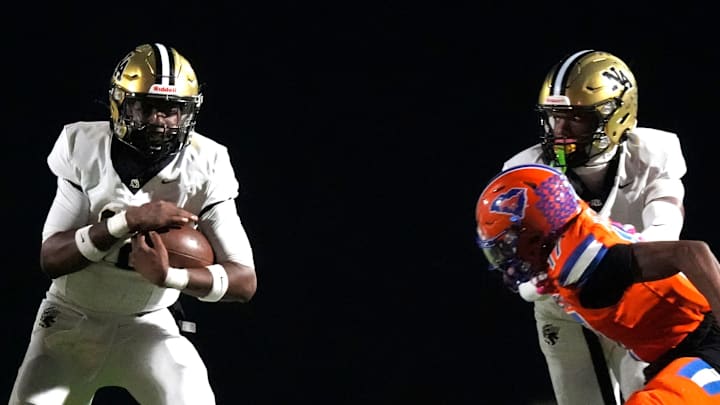 Oct 31, 2025; Graniteville, South Carolina, USA; North Augusta wide receiver Isaiah Smith (1) runs the ball during the Midland Valley and North Augusta high school football game at Midland Valley High School. North Augusta won 42-29. Oct 31, 2025; Graniteville, South Carolina, USA; North Augusta wide receiver Isaiah Smith (1) runs the ball during the Midland Valley and North Augusta high school football game at Midland Valley High School. North Augusta won 42-29.