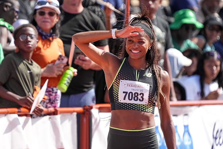 Team USA Red athlete Gabby Thomas walks the track ahead of the 1600 meter relay invitational at the Texas Relays.
