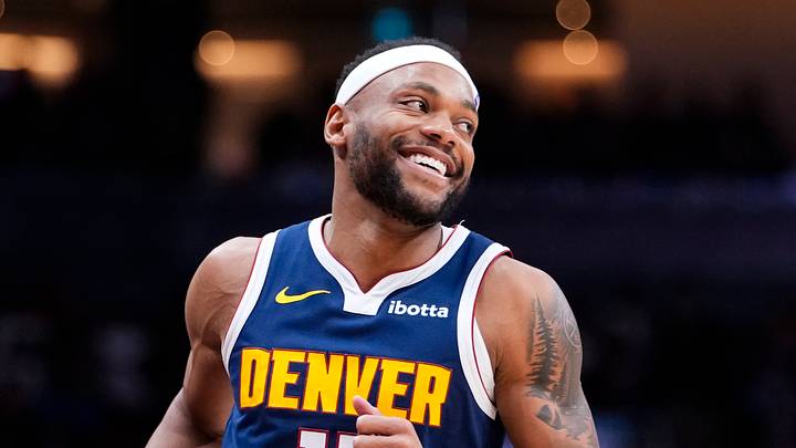 Dec 31, 2025; Toronto, Ontario, CAN; Denver Nuggets guard/forward Bruce Brown (11) smiles during the second half against the Toronto Raptors at Scotiabank Arena. Mandatory Credit: Kevin Sousa-Imagn Images