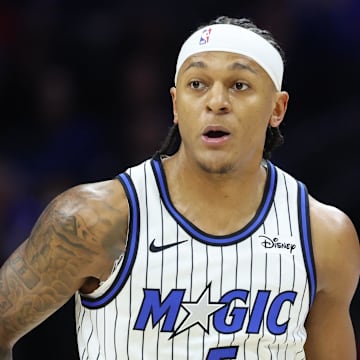 Oct 27, 2025; Philadelphia, Pennsylvania, USA; Orlando Magic forward Paolo Banchero (5) dribbles the ball against the Philadelphia 76ers during the first quarter at Xfinity Mobile Arena. Mandatory Credit: Bill Streicher-Imagn Images