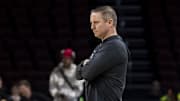 Mar 19, 2025; Wichita, KS, USA;  Georgia Bulldogs head coach Mike White watches his team during a practice session at Intrust Bank Arena. Mandatory Credit: Nick Tre. Smith-Imagn Images