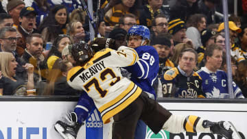 Mar 7, 2024; Boston, Massachusetts, USA; Boston Bruins defenseman Charlie McAvoy (73) checks Toronto