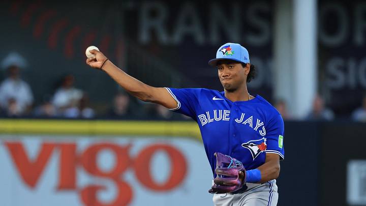 Mar 11, 2026; Tampa, Florida, USA;  Toronto Blue Jays infielder Arjun Nimmala (18) throws the ball to first base for an out during the third inning against the New York Yankees at George M. Steinbrenner Field. Mandatory Credit: Kim Klement Neitzel-Imagn Images