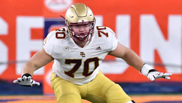 Oct 30, 2021; Syracuse, New York, USA; Boston College Eagles offensive lineman Ozzy Trapilo (70) in pass protestion against the Syracuse Orange in the fourth quarter at the Carrier Dome. Mandatory Credit: Mark Konezny-Imagn Images