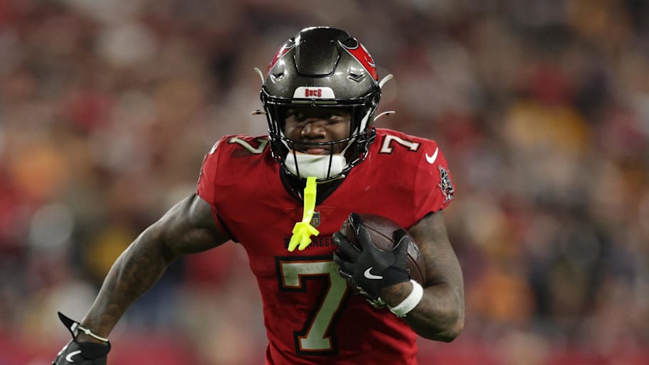 Tampa Bay Buccaneers running back Bucky Irving runs during the fourth quarter of a NFC wild card playoff against the Washington Commanders. | Nathan Ray Seebeck-Imagn Images