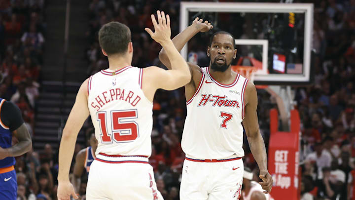 Mar 31, 2026; Houston, Texas, USA; Houston Rockets forward Kevin Durant (7) and guard Reed Sheppard (15) react after a play during the third quarter against the New York Knicks at Toyota Center. Mandatory Credit: Troy Taormina-Imagn Images