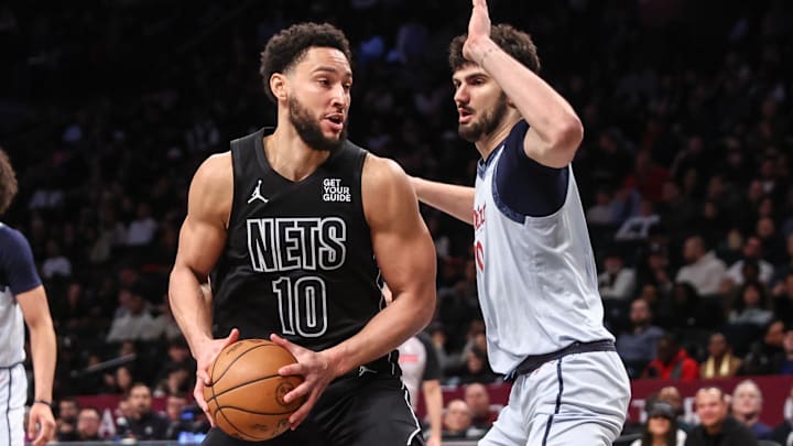 Feb 5, 2025; Brooklyn, New York, USA;  Brooklyn Nets guard Ben Simmons (10) looks to post up against Washington Wizards forward Tristan Vukcevic (00) in the third quarter at Barclays Center. Mandatory Credit: Wendell Cruz-Imagn Images