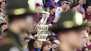Oct 25, 2025; Baton Rouge, Louisiana, USA; A fan of the Louisiana State Tigers holds a sign after losing to the Texas A&M Aggies at Tiger Stadium. Mandatory Credit: Stephen Lew-Imagn Images