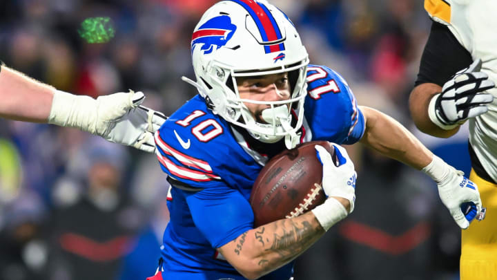 Jan 15, 2024; Orchard Park, New York, USA; Buffalo Bills wide receiver Khalil Shakir (10) runs for a touchdown after a catch in the fourth quarter of a 2024 AFC wild card game against the Pittsburgh Steelers at Highmark Stadium. Mandatory Credit: Mark Konezny-USA TODAY Sports