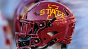 Nov 9, 2024; Kansas City, Missouri, USA; Iowa State Cyclones helmets on the bench during the first quarter against the Kansas Jayhawks at GEHA Field at Arrowhead Stadium. 