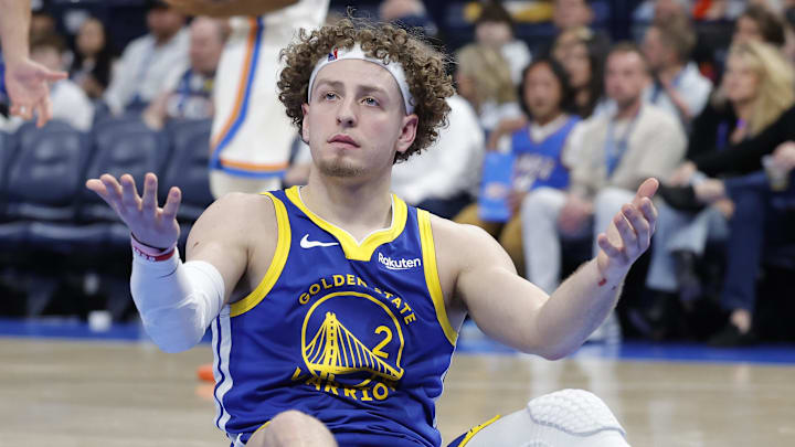 Mar 7, 2026; Oklahoma City, Oklahoma, USA; Golden State Warriors guard Brandin Podziemski (2) reacts after a play against the Oklahoma City Thunder during the second half at Paycom Center. Mandatory Credit: Alonzo Adams-Imagn Images