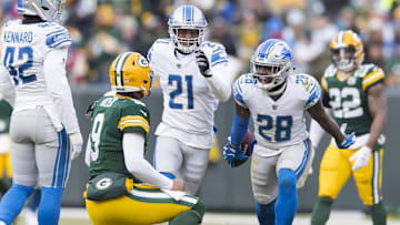 Dec 30, 2018; Green Bay, WI, USA; Detroit Lions cornerback Quandre Diggs (28) celebrates after intercepting a pass from Green Bay Packers quarterback DeShone Kizer (9) during the fourth quarter at Lambeau Field. Mandatory Credit: Jeff Hanisch-Imagn Images