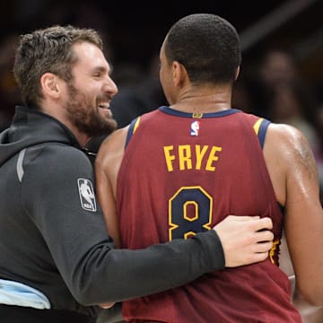 Jan 28, 2018; Cleveland, OH, USA; Cleveland Cavaliers forward Kevin Love (0) and forward Channing Frye (8) celebrate after a basket during the first half against the Detroit Pistons at Quicken Loans Arena. Mandatory Credit: Ken Blaze-Imagn Images