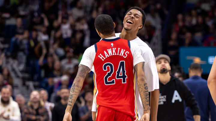 Nov 18, 2023; New Orleans, Louisiana, USA; New Orleans Pelicans guard Jordan Hawkins (24) and guard Trey Murphy III (25) chest bump after making a three point basket against the Minnesota Timberwolves during the second half at the Smoothie King Center. Mandatory Credit: Stephen Lew-USA TODAY Sports