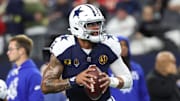 Dallas Cowboys quarterback Dak Prescott warms up before the game against the Kansas City Chiefs at AT&T Stadium.