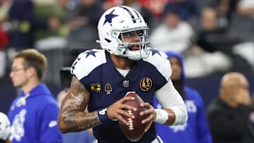 Dallas Cowboys quarterback Dak Prescott warms up before the game against the Kansas City Chiefs at AT&T Stadium.