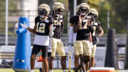 Aug 1, 2023; Metairie, LA, USA;  New Orleans Saints wide receiver Chris Olave (12) and wide receiver A.T. Perry (17) dance during  training camp at the Ochsner Sports Performance Center. Mandatory Credit: Stephen Lew-USA TODAY Sports