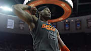 Mar 7, 2020; Austin, Texas, USA; Oklahoma State Cowboys forward Cameron McGriff (12) flexes his bicep after drawing a foul after scoring in the second half of the game against the Texas Longhorns at Frank C. Erwin Jr. Center. Mandatory Credit: Scott Wachter-Imagn Images