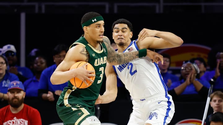 Mar 16, 2025; Fort Worth, TX, USA;  UAB Blazers forward Yaxel Lendeborg (3) drives to the basket as Memphis Tigers forward Nicholas Jourdain (2) defends during the first half at Dickies Arena. Mandatory Credit: Chris Jones-Imagn Images