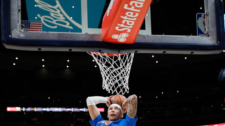 Oct 3, 2022; Denver, Colorado, USA; Oklahoma City Thunder forward Lindy Waters III (12) warms up before game against the Denver Nuggets at Ball Arena. Mandatory Credit: Isaiah J. Downing-USA TODAY Sports