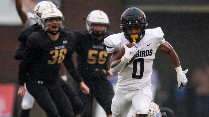 Pearl Cohn's Malachi Cromwell (0) runs the ball against Upperman during the third quarter of the Class 4A Championship game at Finley Stadium in Chattanooga, Tenn., Saturday, Dec. 2, 2023.