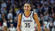 Feb 12, 2025; Storrs, Connecticut, USA; UConn Huskies guard Azzi Fudd (35) reacts after her three point basket against the St. John's Red Storm in the second half at Harry A. Gampel Pavilion. Mandatory Credit: David Butler II-Imagn Images
