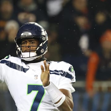 Dec 26, 2024; Chicago, Illinois, USA; Seattle Seahawks quarterback Geno Smith (7) throws a pass downfield during the first quarter against the Chicago Bears at Soldier Field. Mandatory Credit: Talia Sprague-Imagn Images