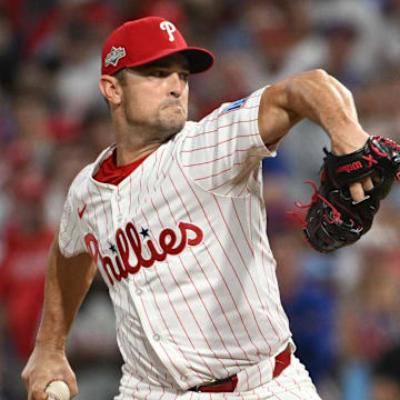 Oct 4, 2025; Philadelphia, Pennsylvania, USA; Philadelphia Phillies pitcher David Robertson (30) throws a pitch during the seventh inning against the Los Angeles Dodgers during game one of the NLDS round for the 2025 MLB playoffs at Citizens Bank Park. Mandatory Credit: Eric Hartline-Imagn Images