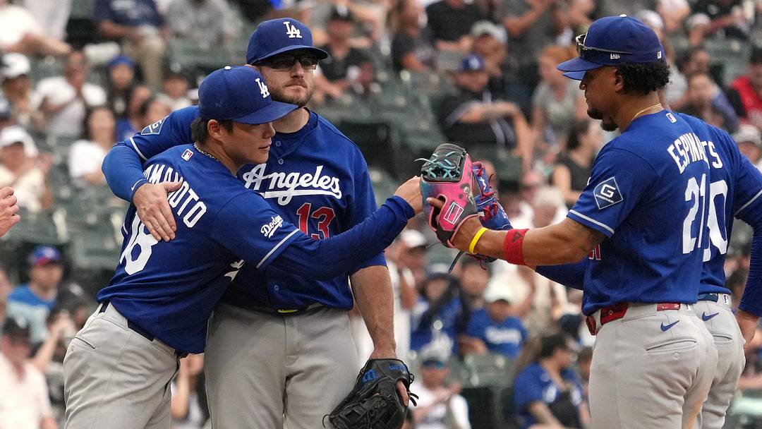 Jun 13, 2026; Chicago, Illinois, USA; Los Angeles Dodgers pitcher Yoshinobu Yamamoto (18) and third baseman Max Muncy (13) hug after Yamamoto leaves the game against the Chicago White Sox during the ninth inning at Rate Field. Mandatory Credit: David Banks-Imagn Images Jun 13, 2026; Chicago, Illinois, USA; Los Angeles Dodgers pitcher Yoshinobu Yamamoto (18) and third baseman Max Muncy (13) hug after Yamamoto leaves the game against the Chicago White Sox during the ninth inning at Rate Field. Mandatory Credit: David Banks-Imagn Images