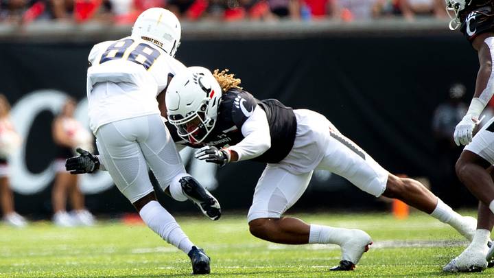 Cincinnati Bearcats safety Bryan Cook (6) hits Murray State Racers wide receiver Deshun Britten (88) in the first half of the NCAA football game between Cincinnati Bearcats and Murray State Racers on Saturday, Sept. 11, 2021, at Nippert Stadium in Cincinnati.

Murray State Racers At Cincinnati Bearcats