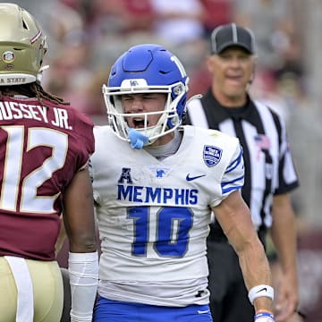 Sep 14, 2024; Tallahassee, Florida, USA; Memphis Tigers wide receiver Koby Drake (10) celebrates after a big play against the Florida State Seminoles during the first half at Doak S. Campbell Stadium. Mandatory Credit: Melina Myers-Imagn Images